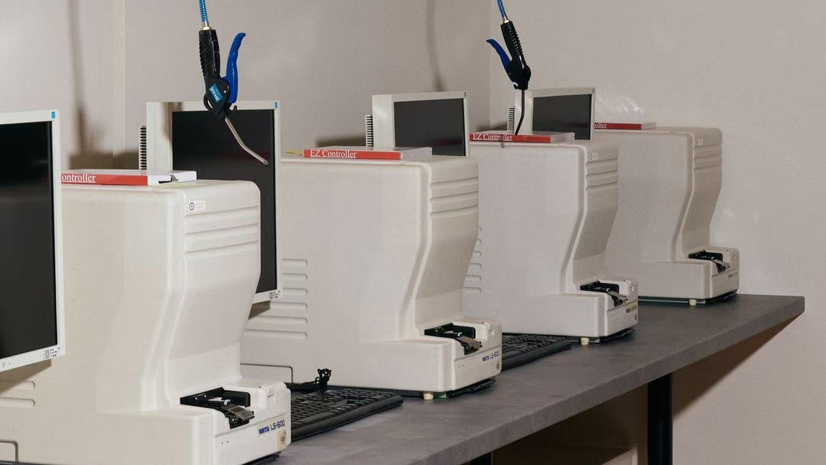 A row of Noritsu film scanners at Irohas Photo