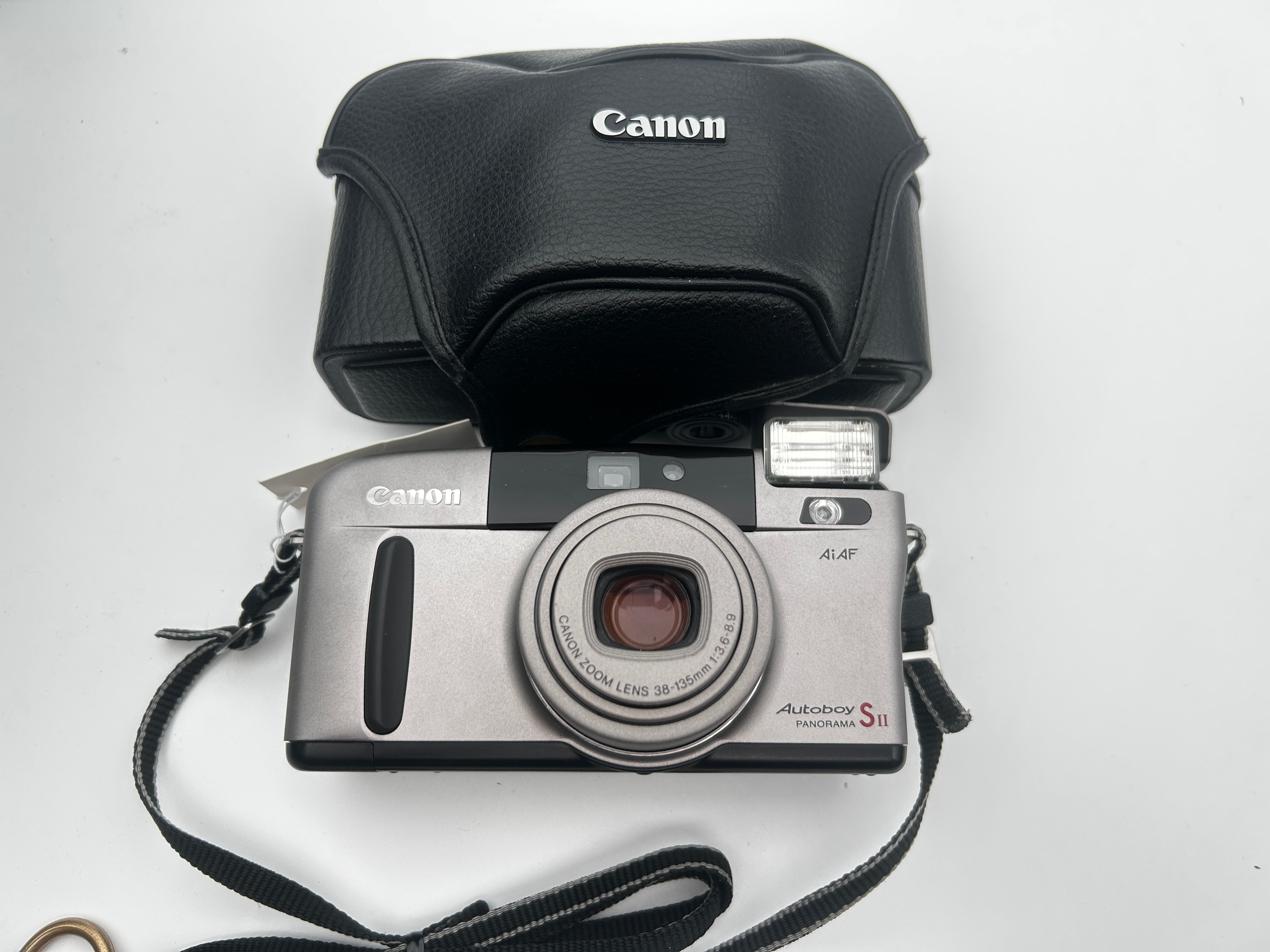 Canon Autoboy S II camera with leather case
