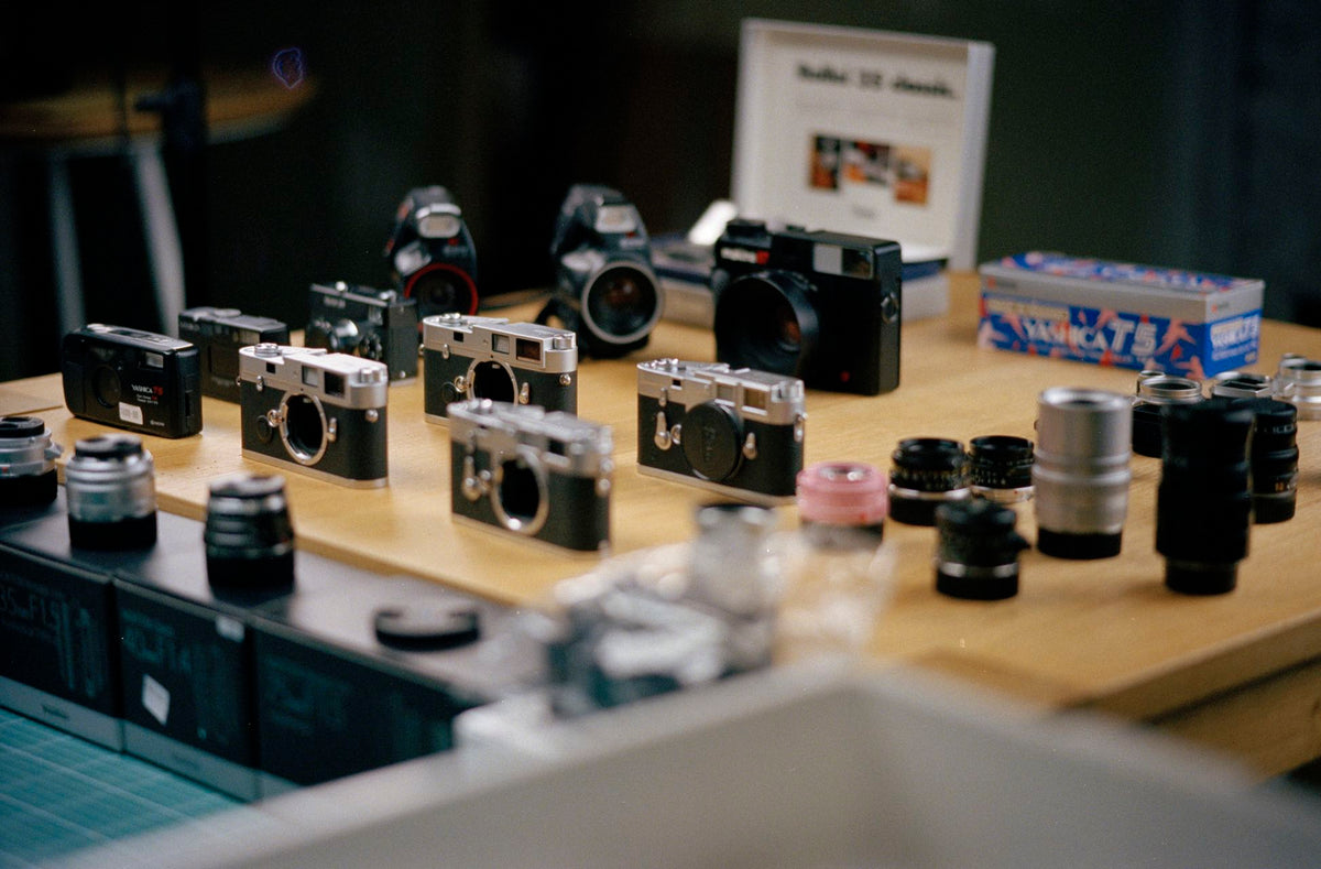 Pre-owned cameras and lenses on display at Irohas Photo